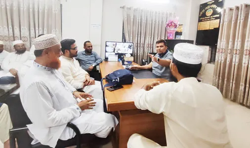 টঙ্গীতে ওসির সঙ্গে নিরাপত্তা বিষয়ক আলোচনায় জামায়াত প্রার্থী ড. হাফিজুর রহমান